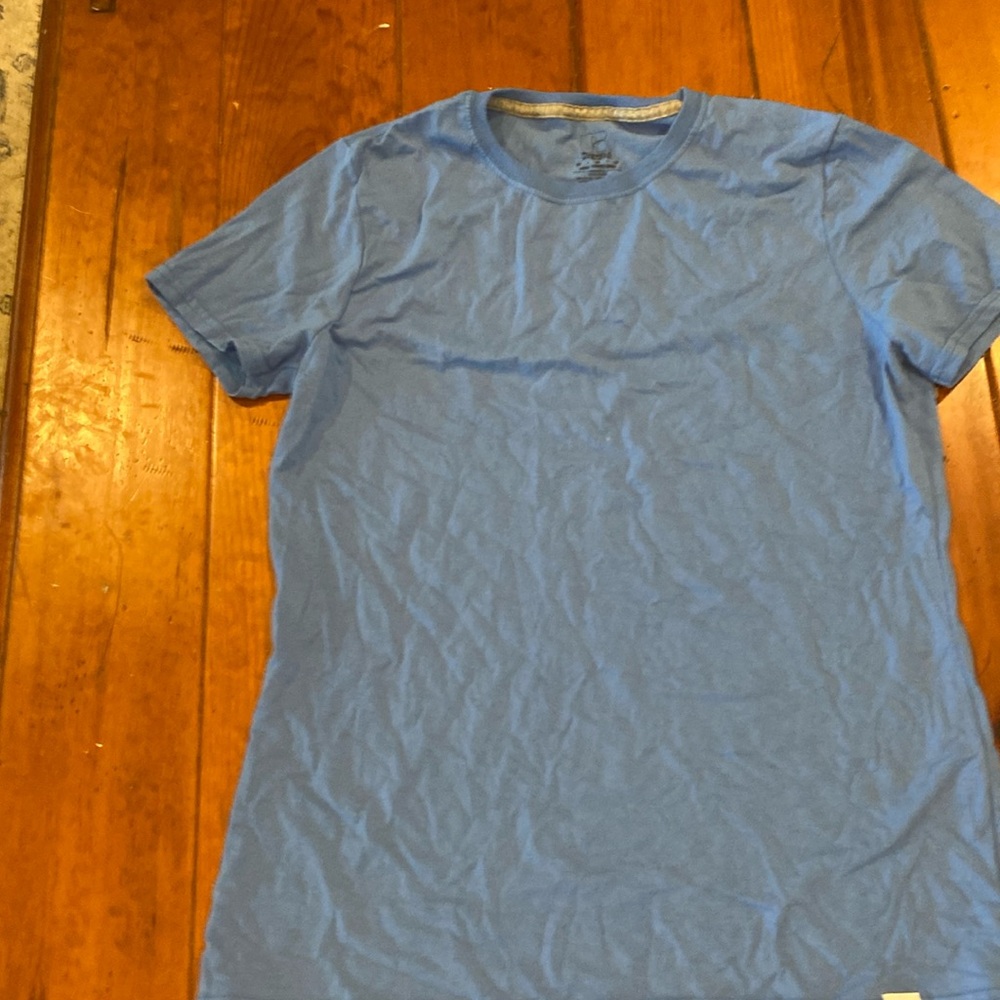Blue women’s medium tee is great for layering or being active.